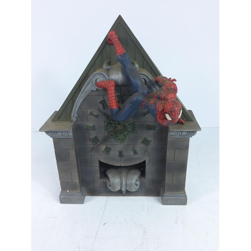 105 - 2 Spiderman clock tower wall statues