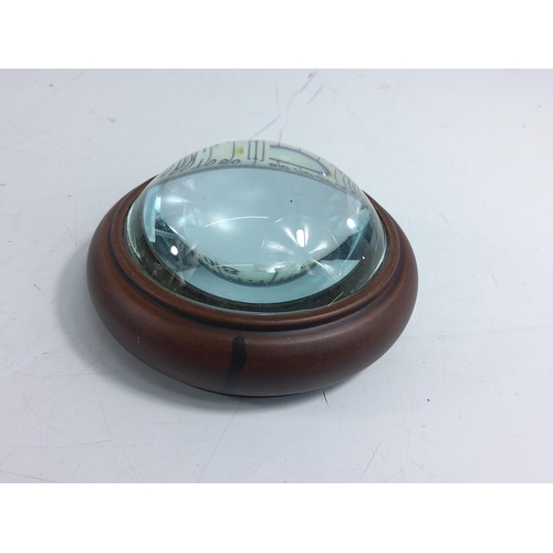 281 - Wooden mounted compass, 9cms in diameter