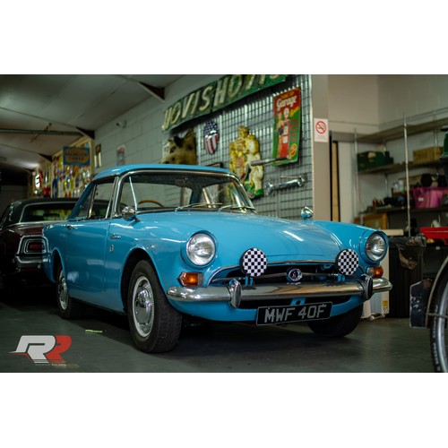 11 - Blue Sunbeam Alpine registration MWF40F, this beautiful little car has a 1725cc Petrol engine hiding... 