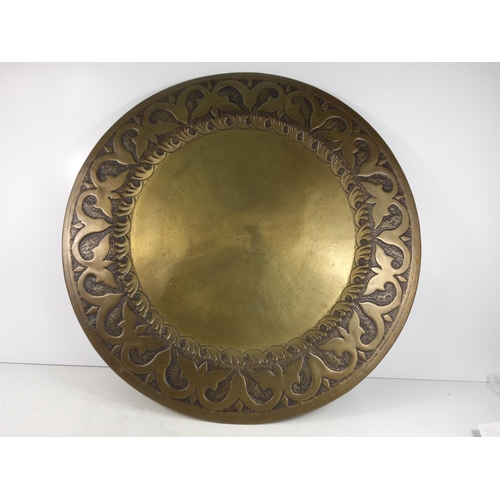 195 - Large brass tray top wall hanging, 76cms in diameter