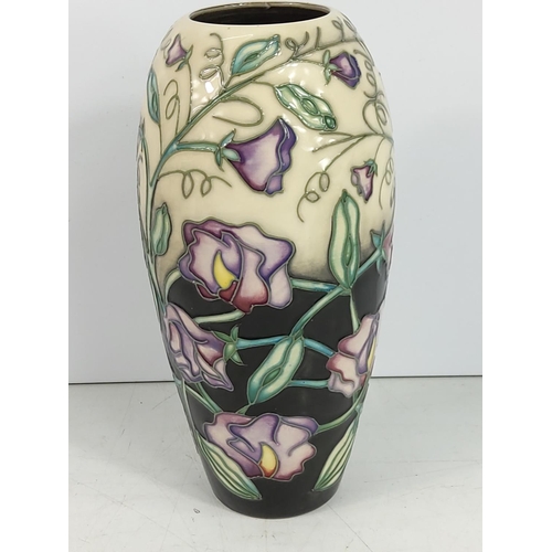 205 - Tall Moorcroft vase dated 2003, 19cms in height