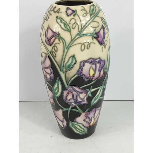 205 - Tall Moorcroft vase dated 2003, 19cms in height