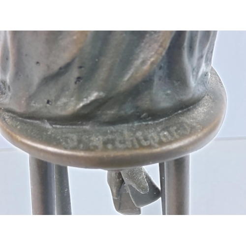 209 - Bronze figure of an art deco lady on stool, 28cms in height