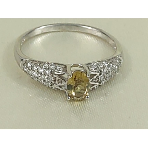 214 - 9ct gold topaz and diamond ring, size N