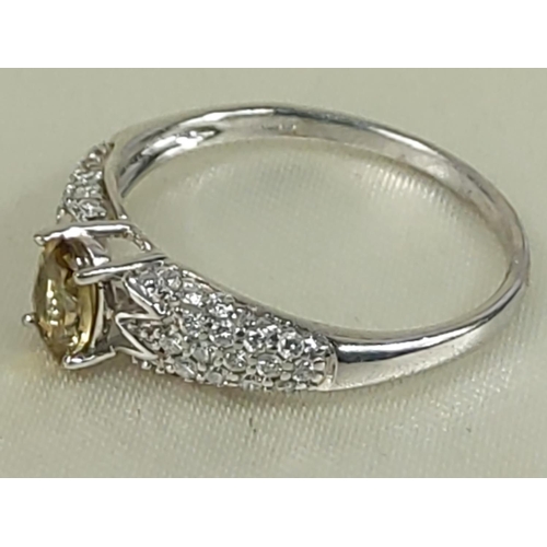 214 - 9ct gold topaz and diamond ring, size N