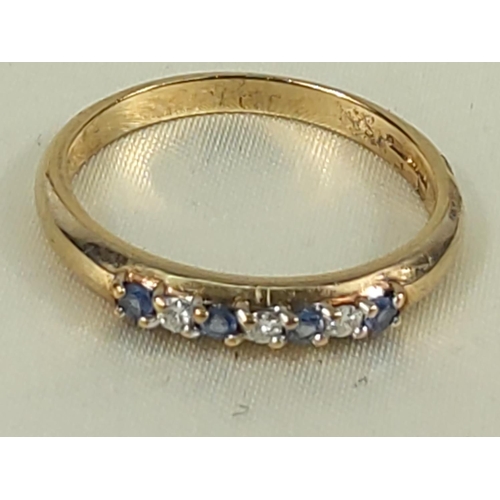 216 - 9ct gold tanzanite and diamond half hoop ring, size U