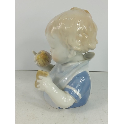 246 - Porcelain baby and porcelain bird