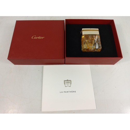 273 - Boxed bottle of Cartier perfume