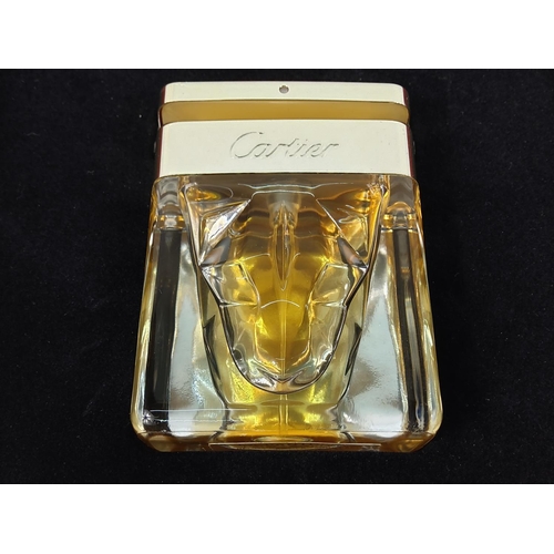 273 - Boxed bottle of Cartier perfume