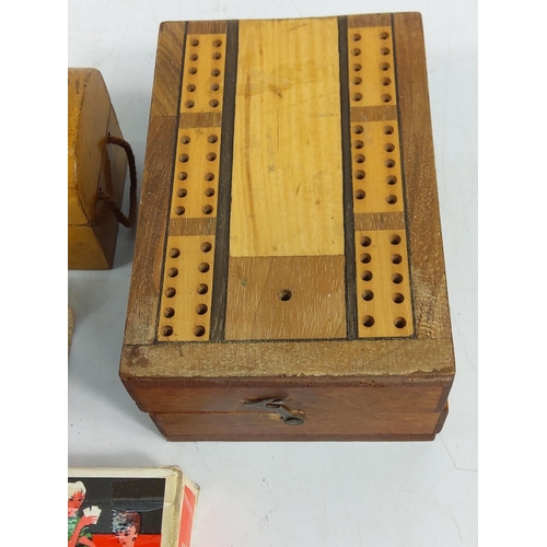 297 - Mauchlin ware box (with receipt) and a crib board