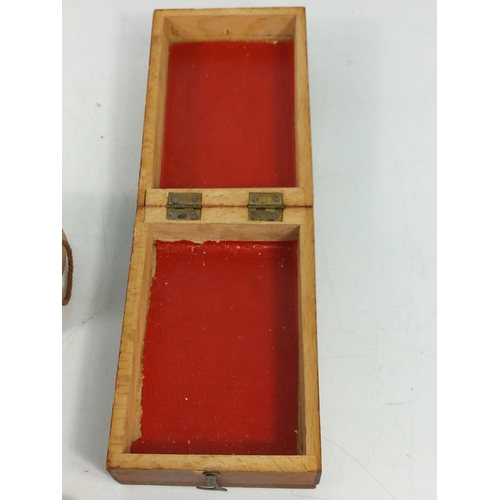 297 - Mauchlin ware box (with receipt) and a crib board