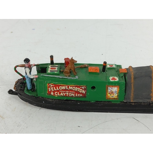 298 - 2 cast metal barge models