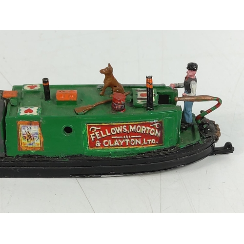 298 - 2 cast metal barge models