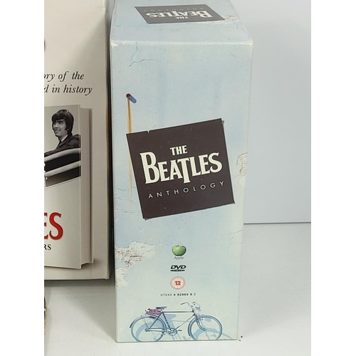 51 - Beatles CD's, vintage 45's and DVD set