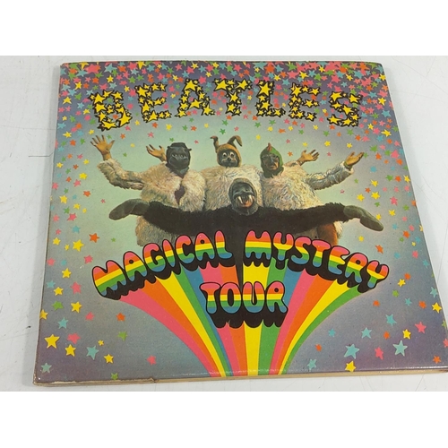 51 - Beatles CD's, vintage 45's and DVD set