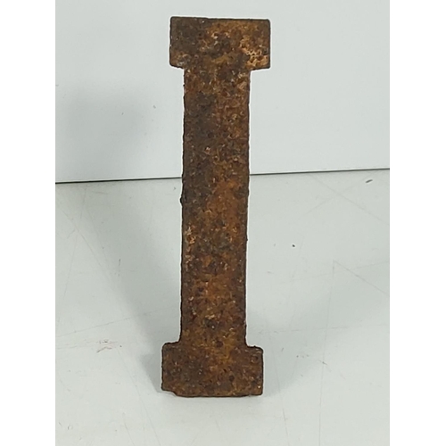 59 - Cast metal Roman numeral markers