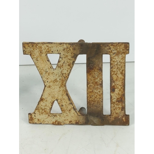 59 - Cast metal Roman numeral markers