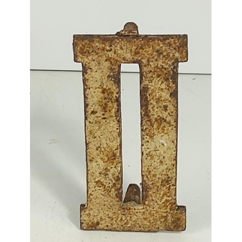 59 - Cast metal Roman numeral markers