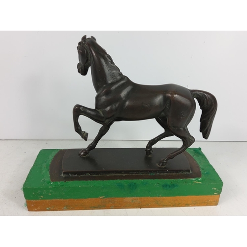 170 - Cast bronze horse on wooden plinth