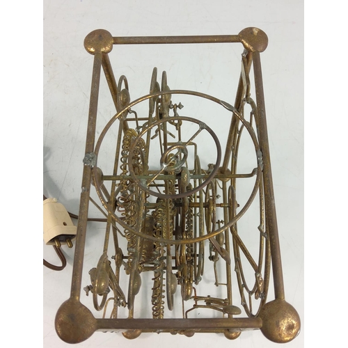 180 - Electric automaton style clock, 24 x 19 x 12cms