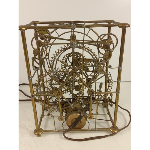 180 - Electric automaton style clock, 24 x 19 x 12cms