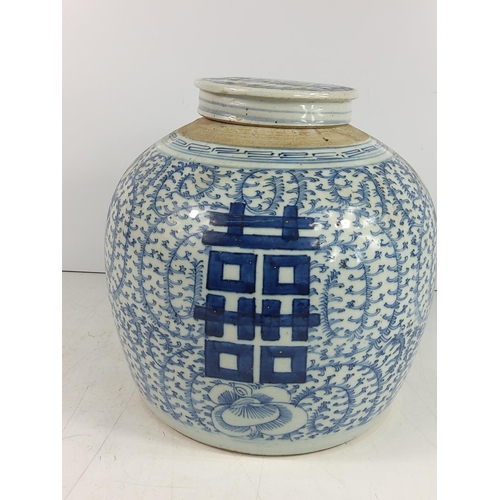 184 - Oriental blue and white jar and cover, 26cms in height