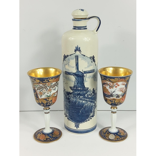 312 - Binoculars, vase, Delft vase and 2 goblets