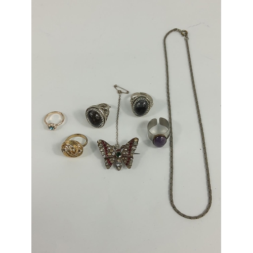 310 - Perfume bottle, jewellery and a stop watch, including a Victorian silver butterfly brooch and a pear... 