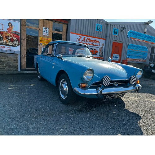 11 - Blue Sunbeam Alpine registration MWF40F, this beautiful little car has a 1725cc Petrol engine hiding... 