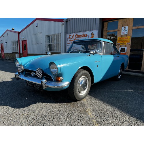 11 - Blue Sunbeam Alpine registration MWF40F, this beautiful little car has a 1725cc Petrol engine hiding... 