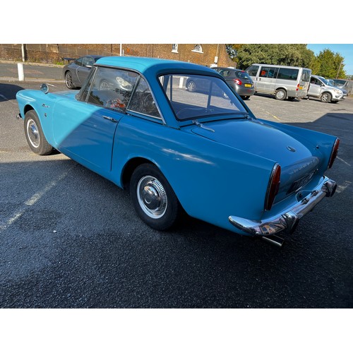 11 - Blue Sunbeam Alpine registration MWF40F, this beautiful little car has a 1725cc Petrol engine hiding... 