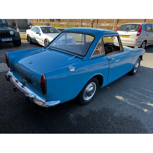 11 - Blue Sunbeam Alpine registration MWF40F, this beautiful little car has a 1725cc Petrol engine hiding... 