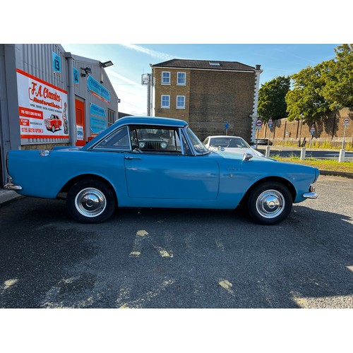 11 - Blue Sunbeam Alpine registration MWF40F, this beautiful little car has a 1725cc Petrol engine hiding... 