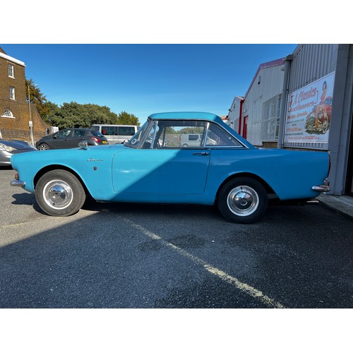 11 - Blue Sunbeam Alpine registration MWF40F, this beautiful little car has a 1725cc Petrol engine hiding... 