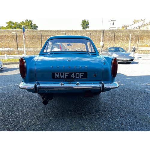 11 - Blue Sunbeam Alpine registration MWF40F, this beautiful little car has a 1725cc Petrol engine hiding... 