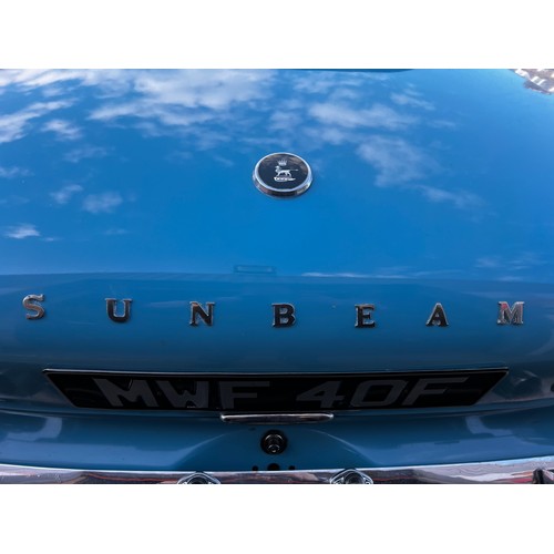 11 - Blue Sunbeam Alpine registration MWF40F, this beautiful little car has a 1725cc Petrol engine hiding... 