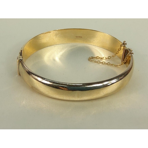 167 - 9ct gold bangle, 13.3g