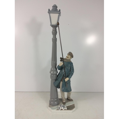 178 - Large Lladro lamp lighter, 48cms in height