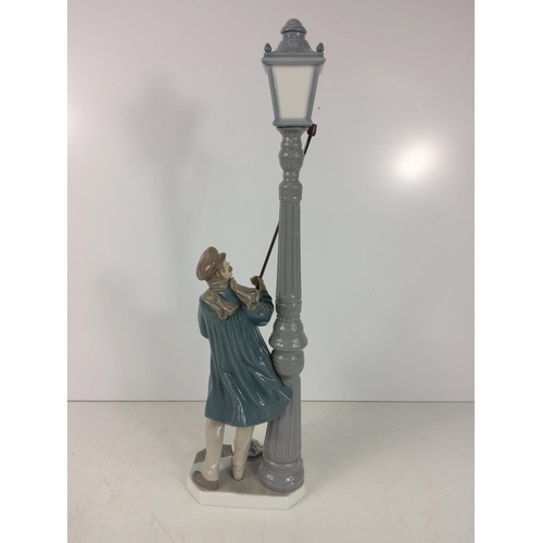 178 - Large Lladro lamp lighter, 48cms in height