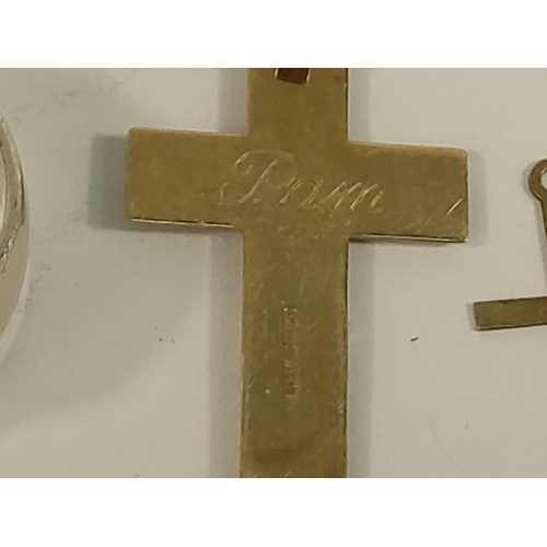 184 - 9ct gold cross and St Christopher (2.9g), silver buckle ring (5.9g), coin and cross and one other cr... 