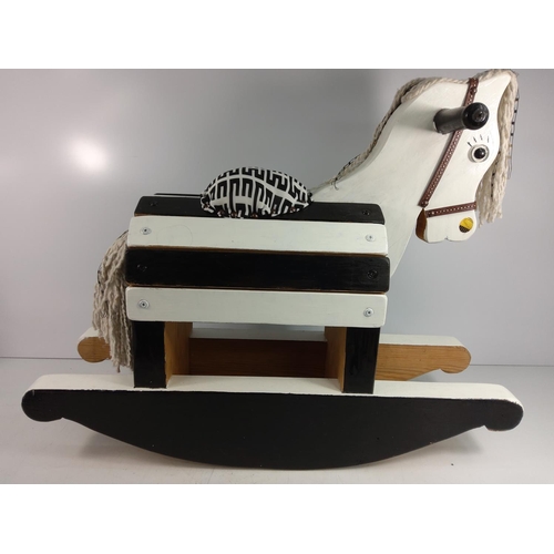 62 - Wooden rocking horse