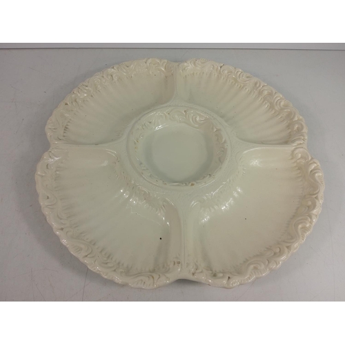 66 - Large white porcelain entre dish, 37cms in diameter and 5 blue and white plates, 11cms in diameter