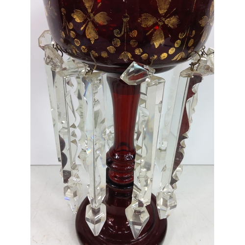 83 - Antique ruby glass lustre centrepiece, 32cms in height & 16cms in diameter