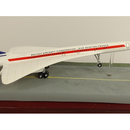 86 - Collectable Concord model on plinth with collectors coin and stamps