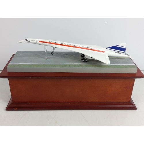 86 - Collectable Concord model on plinth with collectors coin and stamps