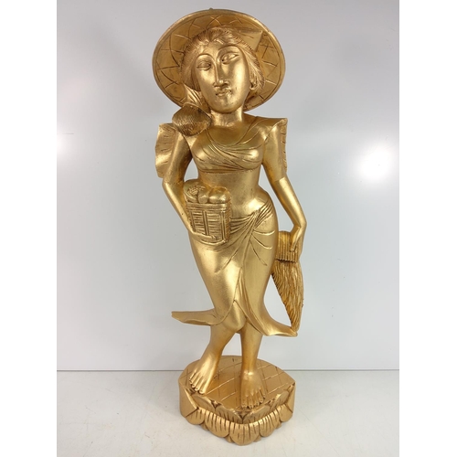 88 - Carved wooden oriental lady, 62cms in height