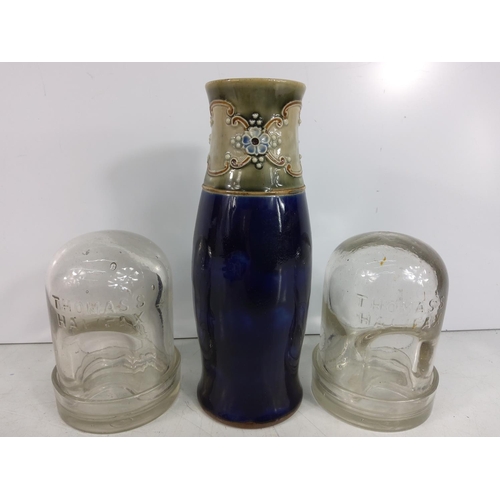 119 - Doulton Lambeth vase, 21cms in height and 2 antique bird waterers, both 12cms in height