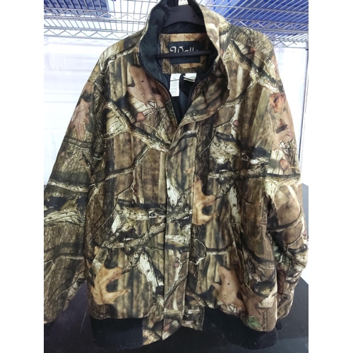 110 - Military smock and camo jacket