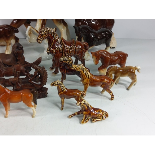 24 - Box of stoneware and box of horse figures