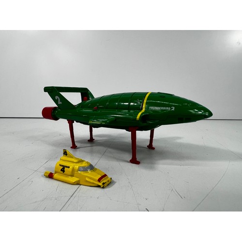 182 - 3 Thunderbird figures, all boxed & Thunderbird 2 & 4 Model